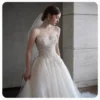 Sweetheart Beaded Ball Gown Wedding Dress with Tulle Train