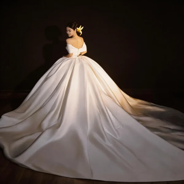 Classic Off-the-Shoulder Satin Wedding Dress with Voluminous Skirt & Lace Details
