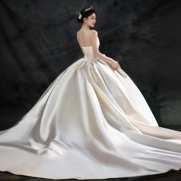 Classic Strapless Satin Wedding Dress with Voluminous Skirt & Lace Details