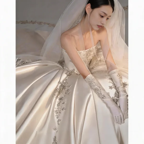 Classic Strapless Satin Wedding Dress with Voluminous Skirt & Lace Details