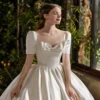 Timeless Satin Ball Gown Wedding Dress with Short Sleeves & Bow Accent