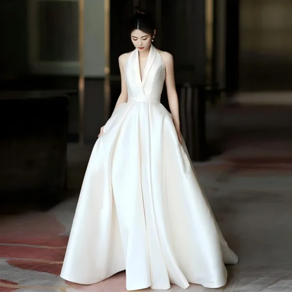Sleek Halter Neck Satin Wedding Dress with Open Back & Pockets