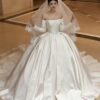 Vintage-Inspired Off-Shoulder Satin Wedding Dress with Elegant Long Sleeves