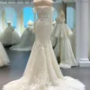 Elegant Long Sleeve Floral Lace Mermaid Wedding Dress with Scalloped Train