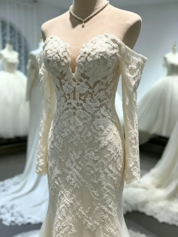 Elegant Long Sleeve Floral Lace Mermaid Wedding Dress with Scalloped Train