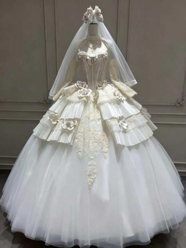 Whimsical Tiered Tulle Bridal Gown with Floral Accents