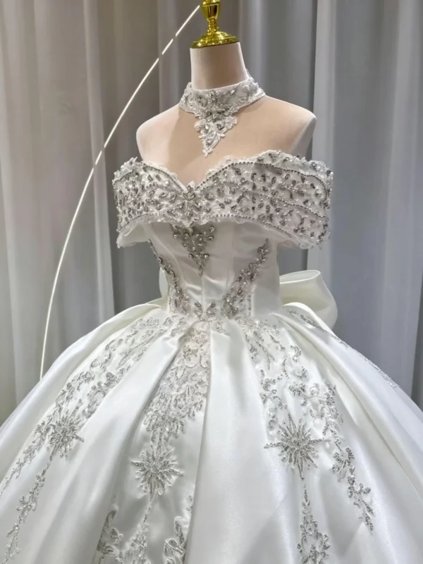 Luxurious Off-the-Shoulder Princess Bridal Gown featuring Majestic Silver Embroidery