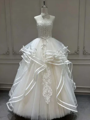 Tiered Wave Bridal Gown with Delicate Bow Ribbon and Vertical Lace Applique
