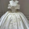 Off-the-Shoulder Heavy Satin Ball Gown featuring Embroidered Lace and Bow Details