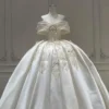 Off-the-Shoulder Heavy Satin Ball Gown featuring Embroidered Lace and Bow Details