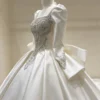 Square Neck Puff Sleeve Beaded Satin Ballgown Wedding Dress With Big Bow