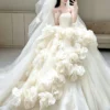 Whimsical Strapless Ball Gown with Cascading 3D Organza Flowers