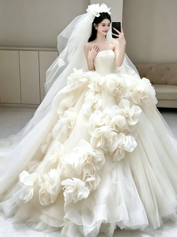 Whimsical Strapless Ball Gown with Cascading 3D Organza Flowers