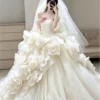 Whimsical Strapless Ball Gown with Cascading 3D Organza Flowers