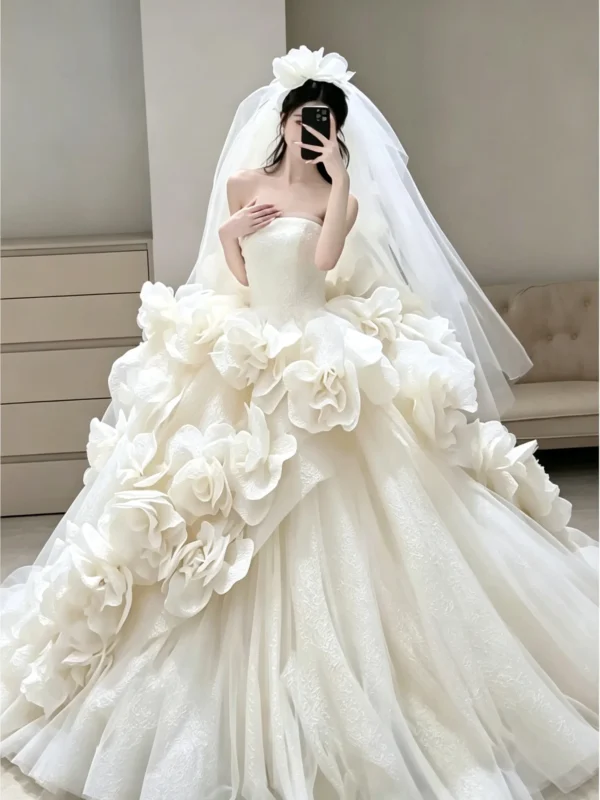 Whimsical Strapless Ball Gown with Cascading 3D Organza Flowers
