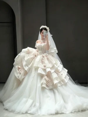 Whimsical Tiered Tulle Bridal Gown with Floral Accents