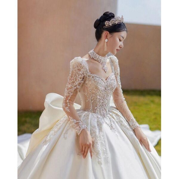 High Neck Illusion Long Sleeve Rhinestone Lace Satin Ball Gown Wedding Dress With Oversized Satin Train Bridal Gown