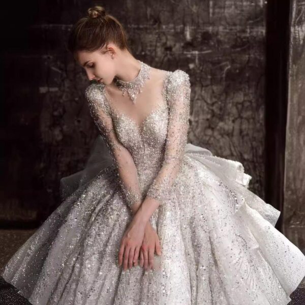 High Neck Illusion Deep V Long Sleeve Full Rhinestone Glitter Tulle Ball Gown Wedding Dress With Side Big Bow Bridal Gown
