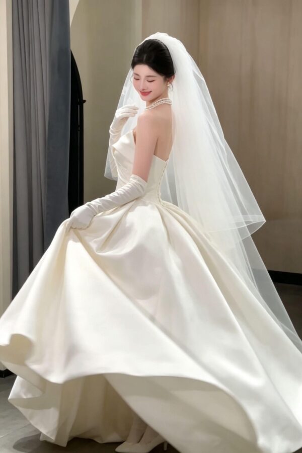 Ivory Strapless Draped Satin Ball Gown
